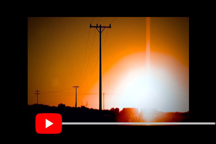 Imagem de poste de luz ao por do sol